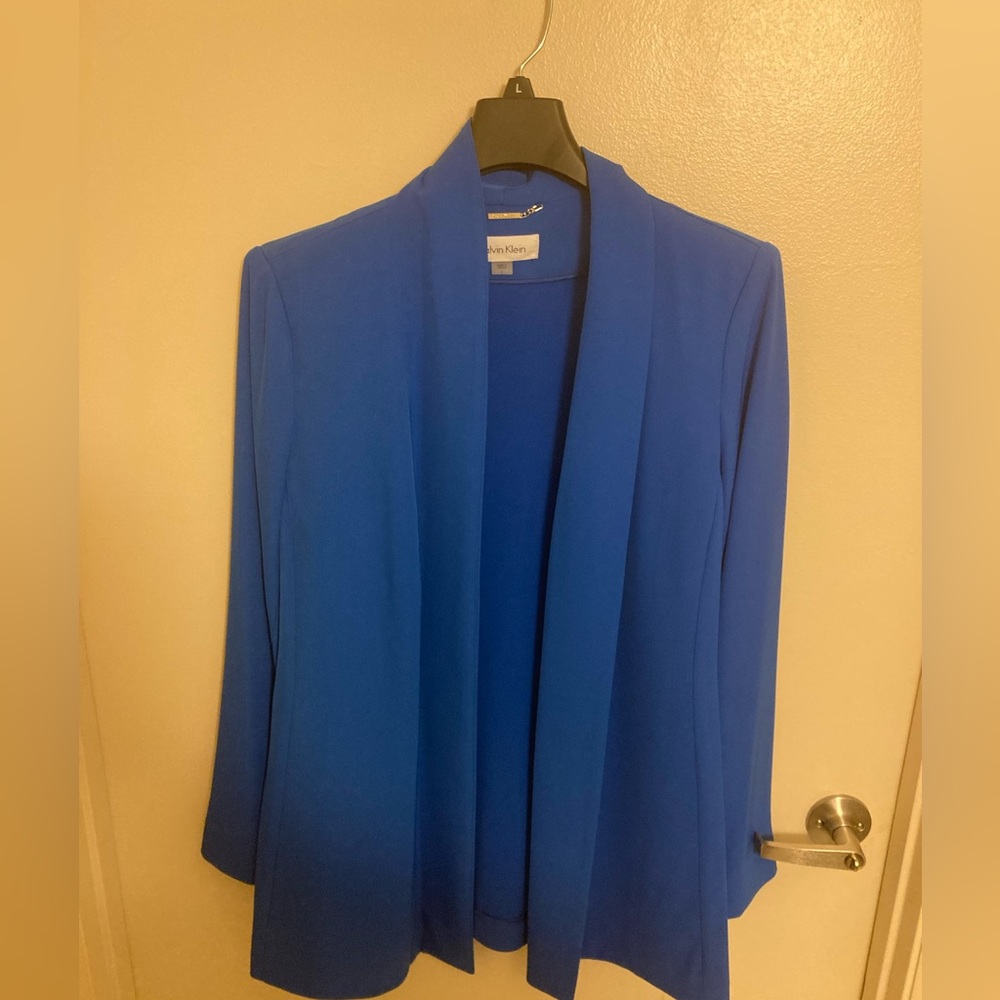 Calvin Klein large Blue business top. Excellent condition worn a couple of times